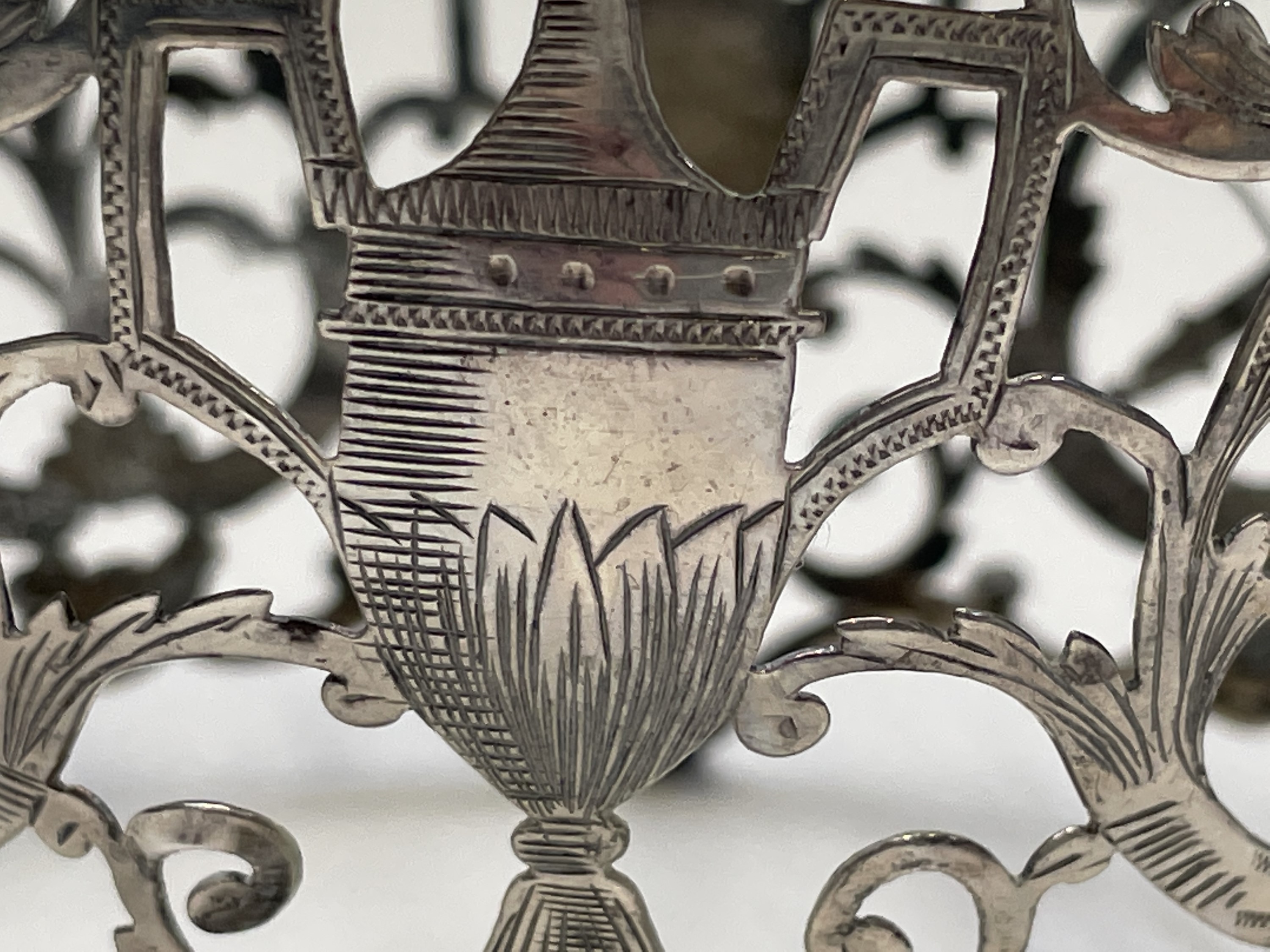 A silver sugar bowl by Goldsmiths & Silversmiths Co Ltd, pierced and engraved in revivalist style, - Image 10 of 14