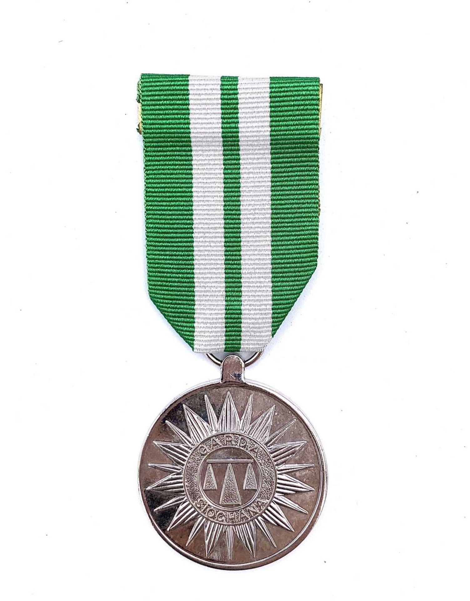 Irish Garda Long Service Medal. A Garda Siochana medal. Condition: please request a condition report