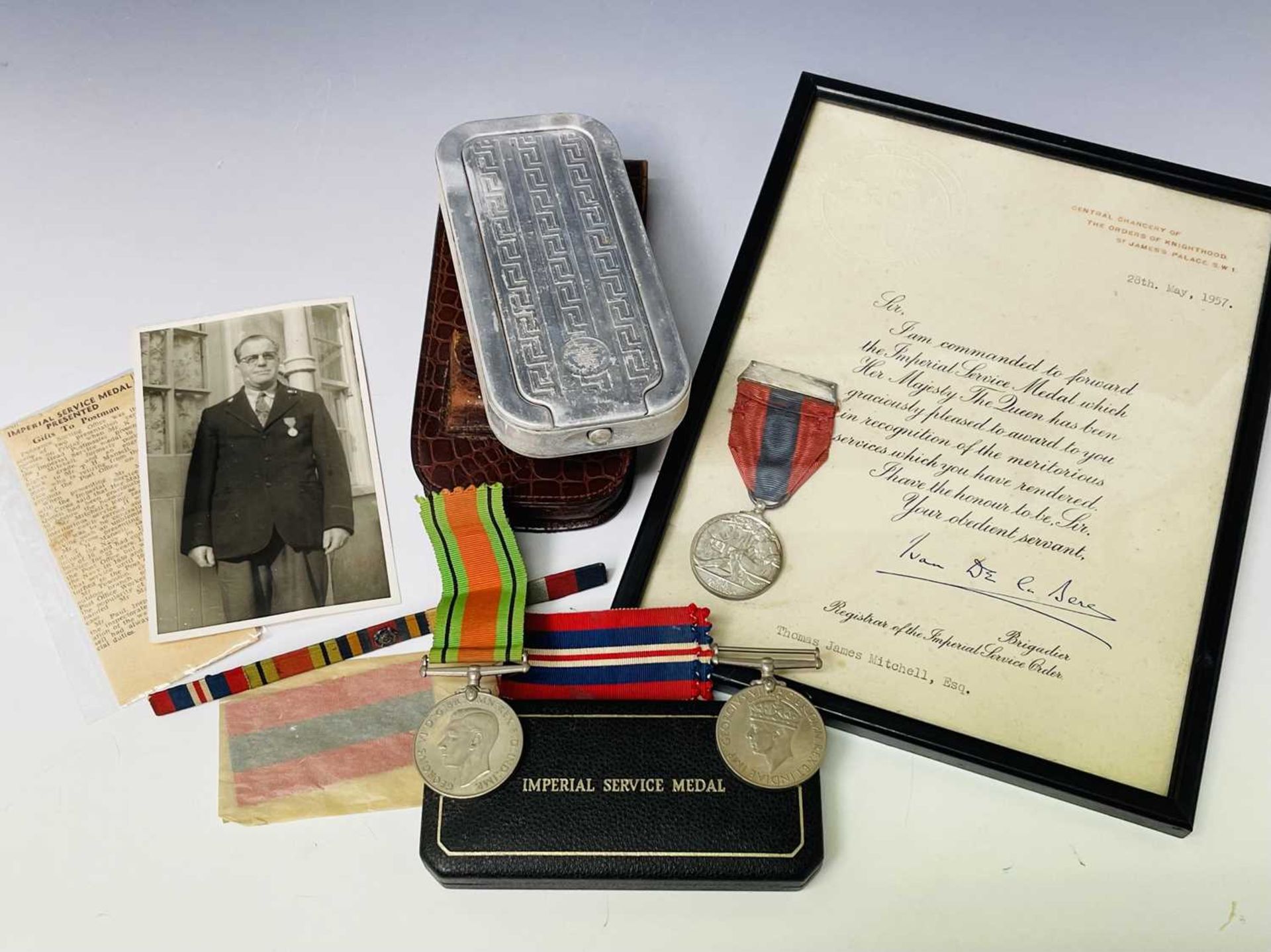 Penzance, Cornwall Interest. Lot comprises a framed and glazed silver Imperial Service Medal with