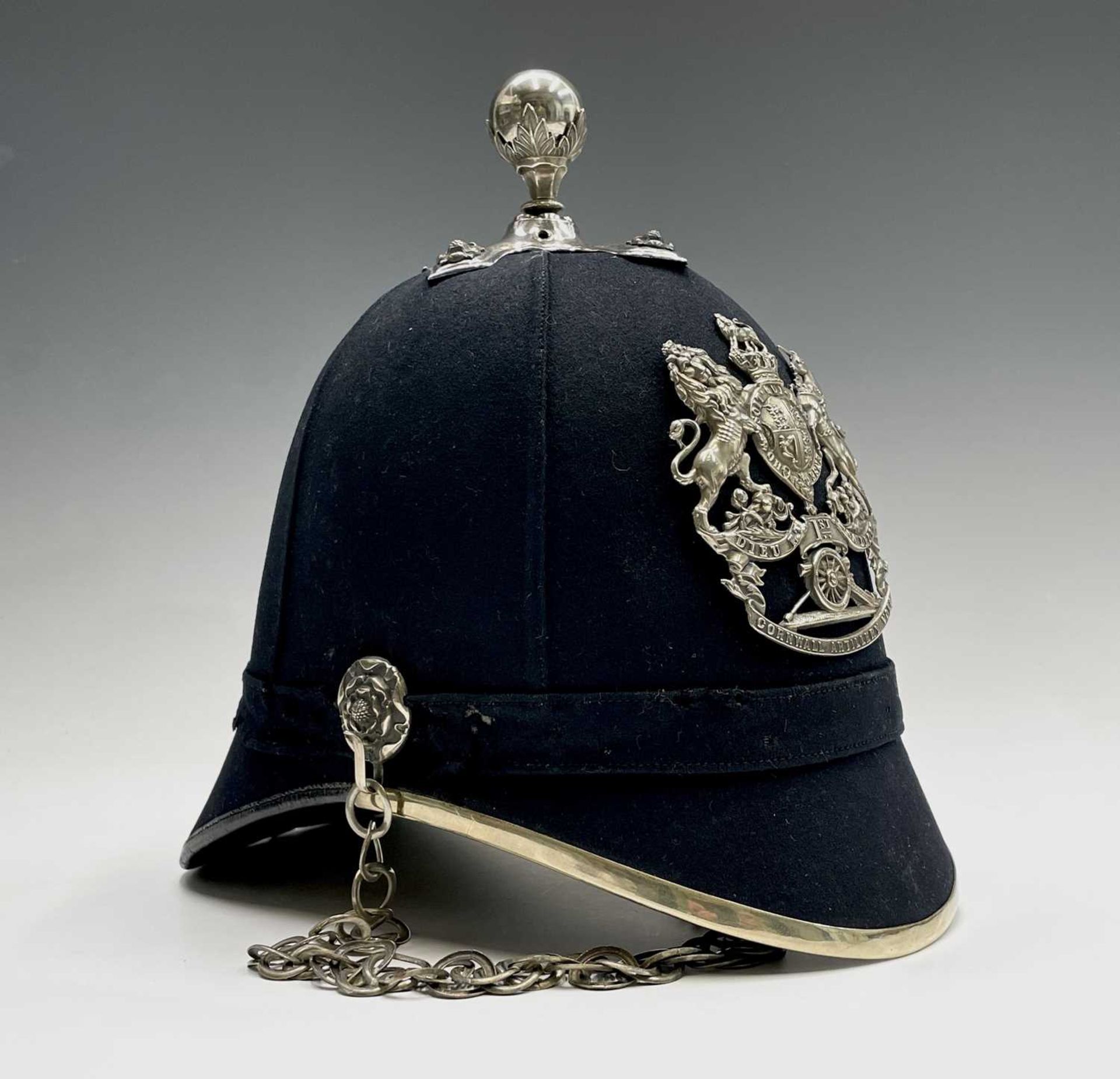 Cornwall Regiments: First Cornwall Artillery Volunteers. A helmet displaying the above badge with - Image 7 of 9