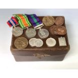 World War Two Trio of Medals and various Horticultural Medallions. Lot comprises a small gas mask?