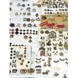 Miscellaneous Cap Badges, Collar Dogs, Shoulder Titles and Buttons. Lot comprises 10 cards and loose