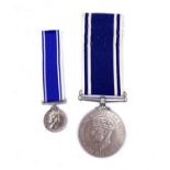 Long Service Medals for Exemplary Police Service (x2). A King George VI medal to "Sergt Herbert J.