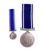 Long Service Medals for Exemplary Police Service (x2). A King George VI medal to "Sergt Herbert J.