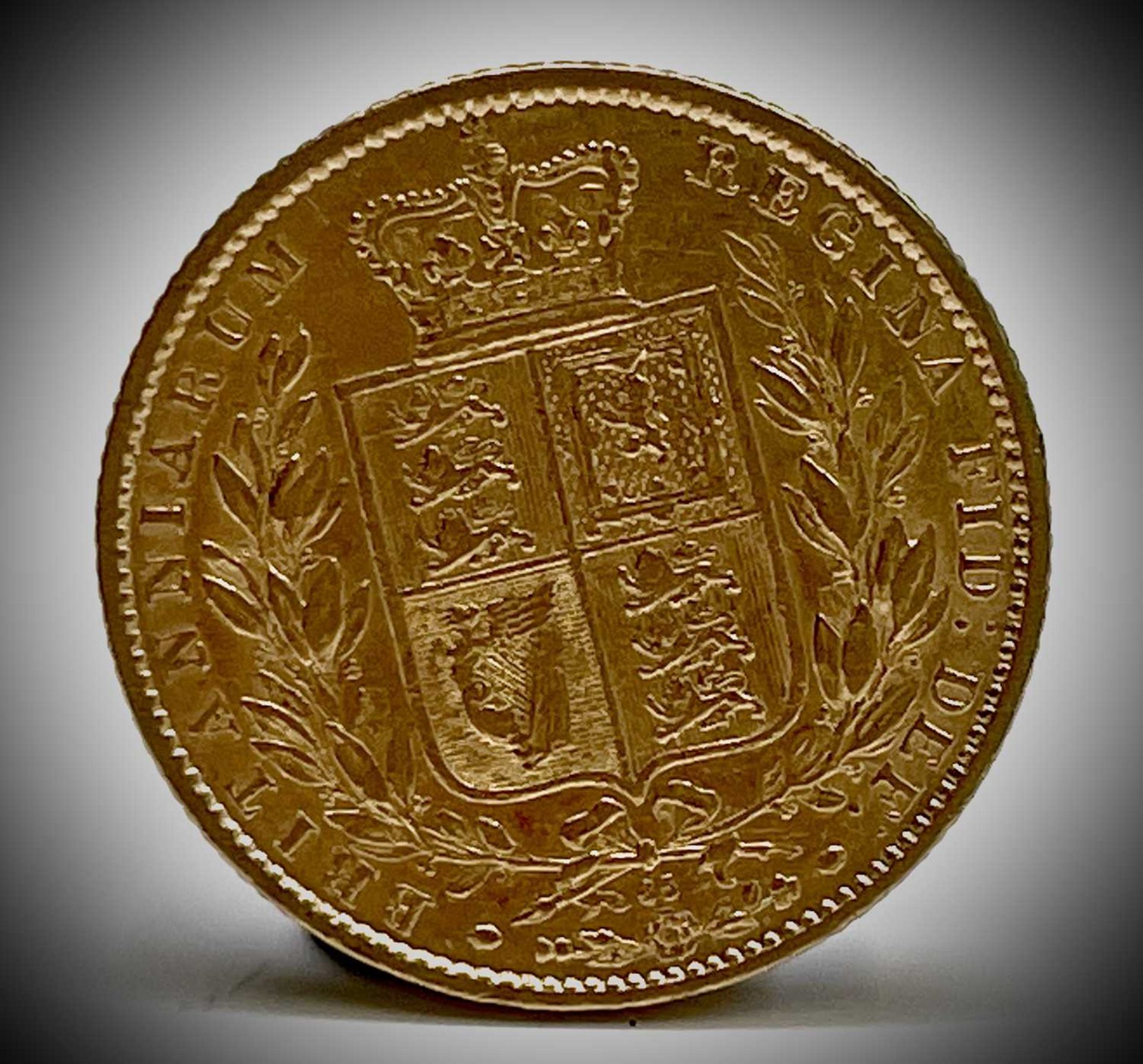 Great Britain Gold Sovereign 1864 Die no.65 Shield Back Condition: please request a condition report