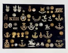 Hussars, Yeomanry Regiments. A display card containing cap badges, collar dogs, shoulder titles