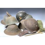 World War Two and later Military Helmets, etc. A box containing five U.S.A and other metal