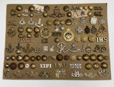 Indian Army. A display card containing cap badges, collar dogs, shoulder titles and buttons. An