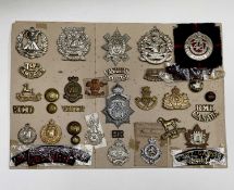 Canadian Scottish and Armoured Cavalry. A display card containing cap badges, shoulder titles and