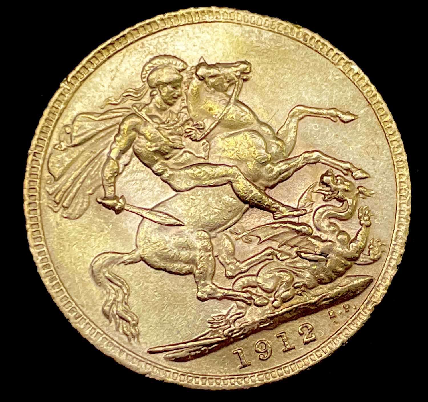 Great Britain Gold Sovereign 1912 slight EK George V Condition: please request a condition report if