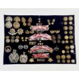English, Scottish and Welsh Regiments - 21st-25th Foot. A display card containing cap badges, collar