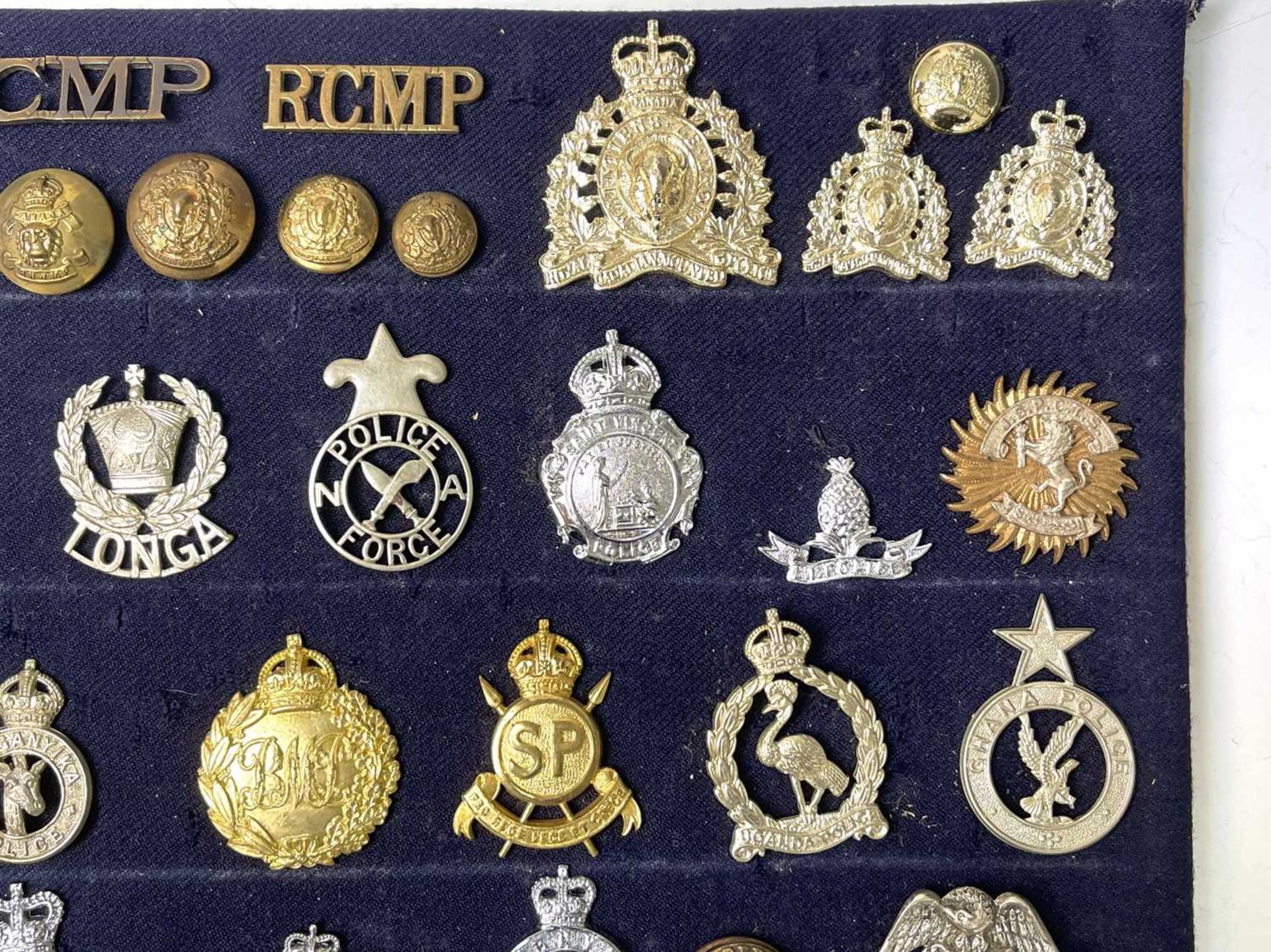 Police Forces - Foreign. A display card of Badges, Buttons and Shoulder Titles. Noted: Tonga Police, - Image 3 of 5