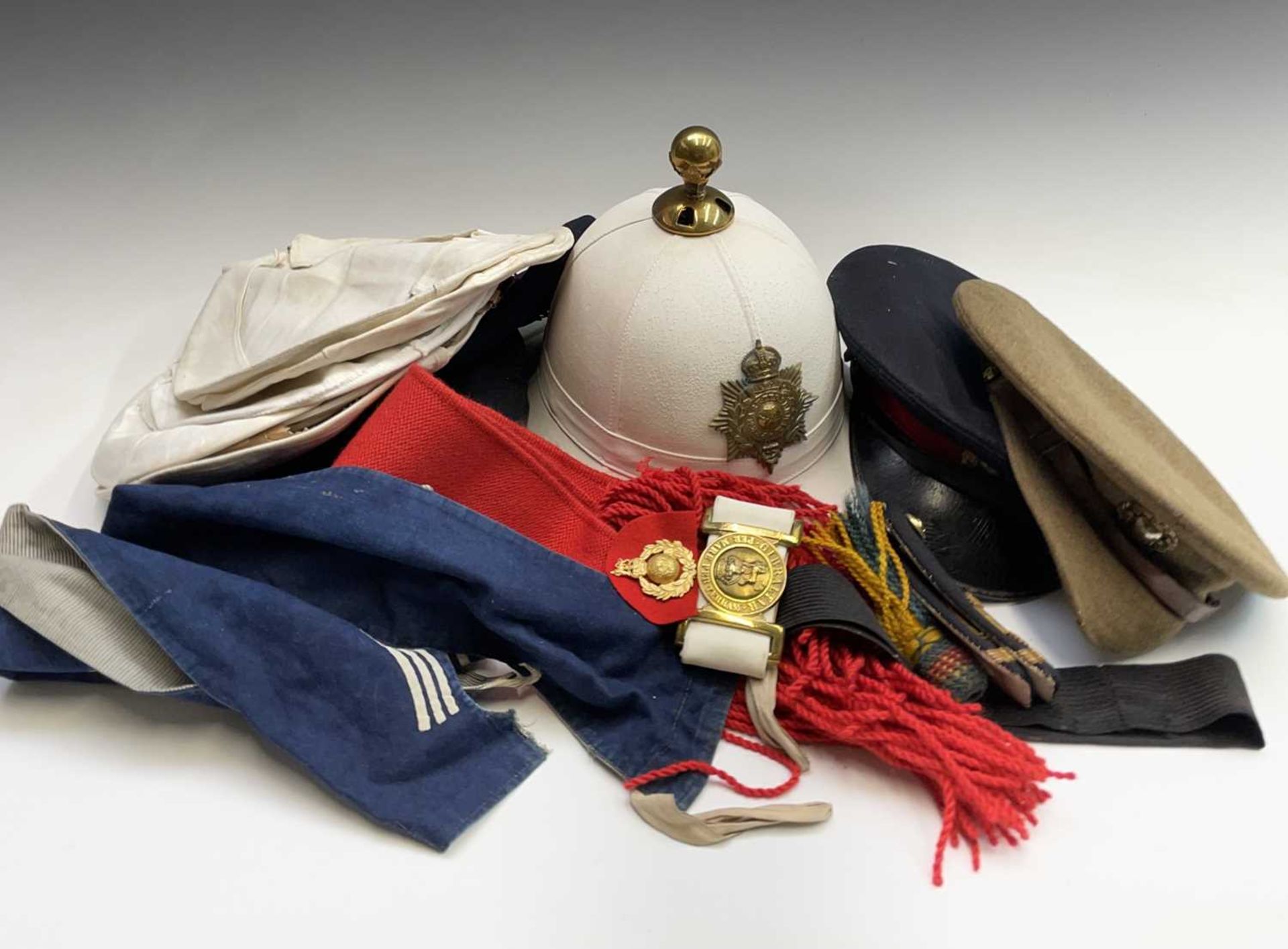 Royal Marines / other Helmets, Hats, etc. Comprising an excellent quality Royal Marines Pith