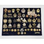 Canadian Infantry. A display card containing cap badges, collar dogs, shoulder titles and buttons.