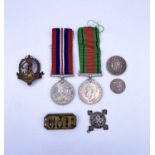 Medals, badges & coins Lots comprises a World War 2 Defence Medal & War Medal, a "CMP" shoulder