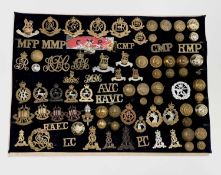 Corps - 2 & Royal Military Police. A display card containing cap badges, collar dogs, shoulder