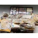 GB & World Stamps - A large box containing a huge accumulation of stamps sorted into packets, on