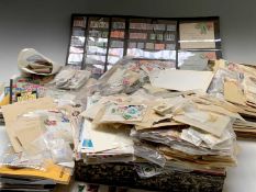 GB & World Stamps - A large box containing a huge accumulation of stamps sorted into packets, on
