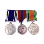 Police Medal Trio. Comprising: Long Service Medal (King George VI), Coronation 1953 Medal (Queen