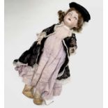 Armand Marseille Porcelain Faced Doll. An Armand Marseille closing eyes doll height 18" inscribed to