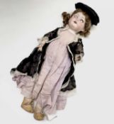 Armand Marseille Porcelain Faced Doll. An Armand Marseille closing eyes doll height 18" inscribed to