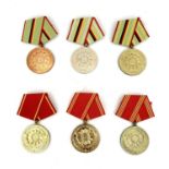 East Germany Police - 10 Different Medals. Excellent meritorious service bronze, silver and gold.