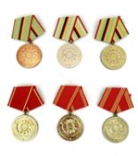 East Germany Police - 10 Different Medals. Excellent meritorious service bronze, silver and gold.