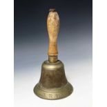 World War Two Air Raid Patrol Hand Bell. A wooden handled brass bell height 10". Condition: please