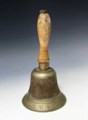 World War Two Air Raid Patrol Hand Bell. A wooden handled brass bell height 10". Condition: please