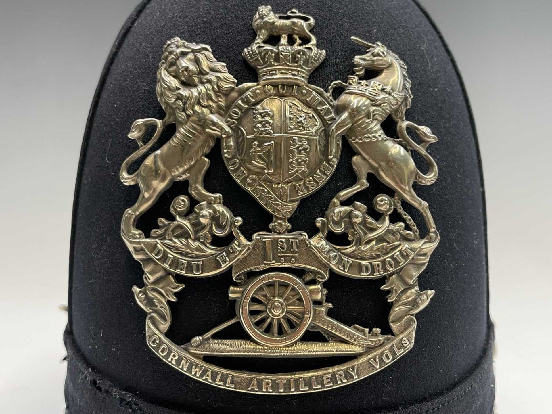 Cornwall Regiments: First Cornwall Artillery Volunteers. A helmet displaying the above badge with - Image 3 of 9