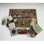World War One Medals and Miscellaneous Military Items. Lot includes a 1914 Mons Star and Bar to