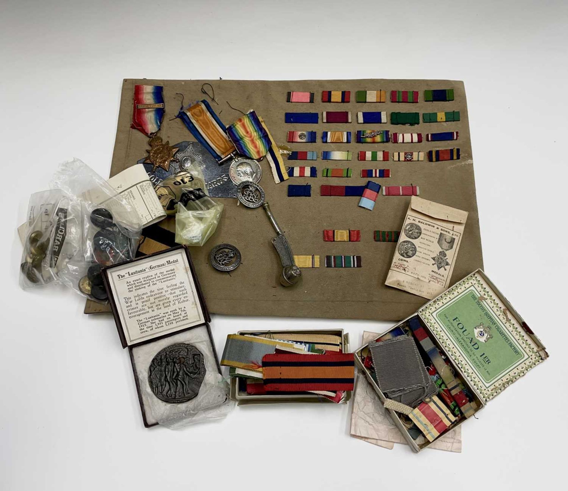 World War One Medals and Miscellaneous Military Items. Lot includes a 1914 Mons Star and Bar to