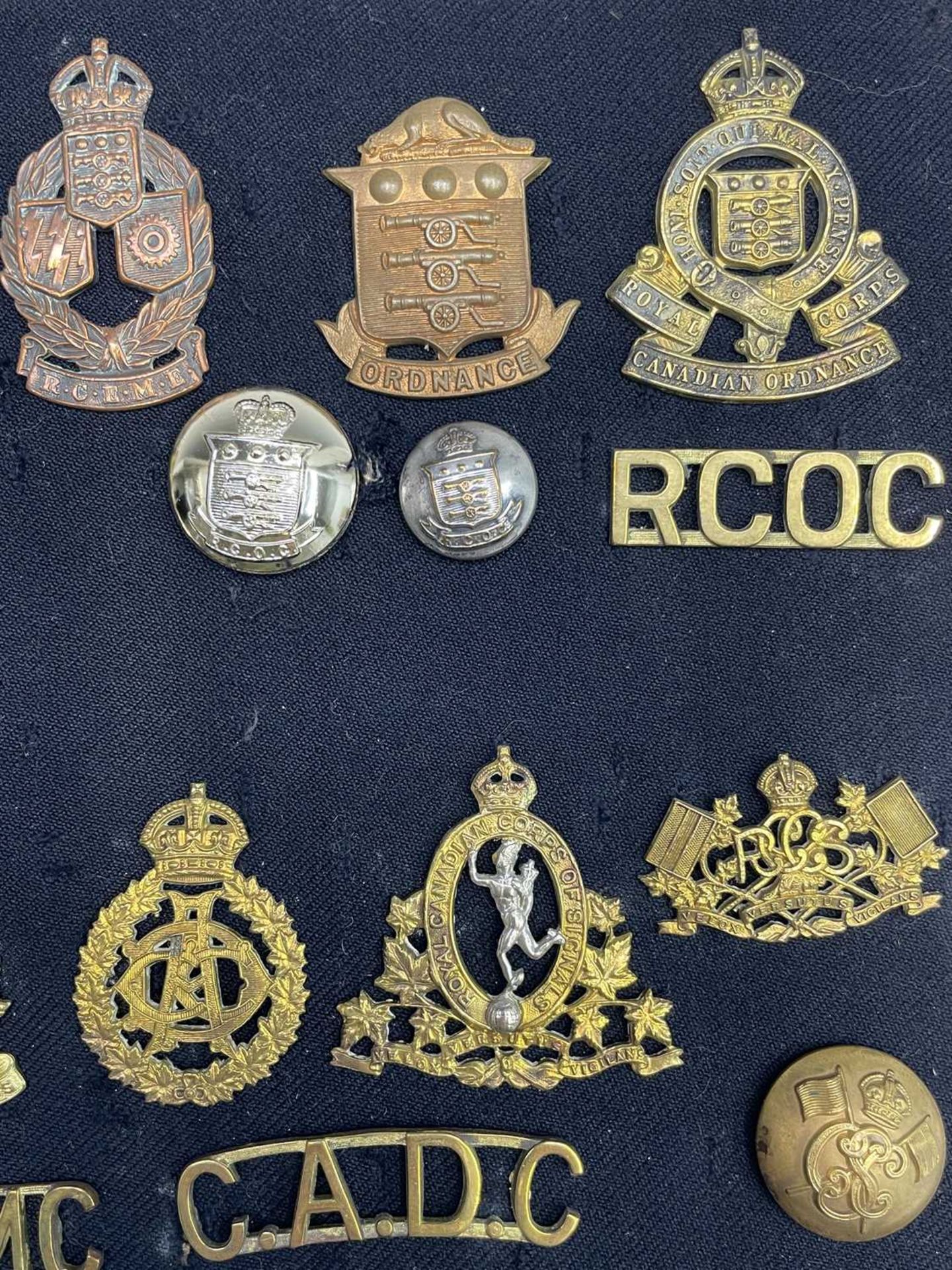 Canadian Corps and A.T.C's. A display card containing cap badges, collar dogs, shoulder titles and - Image 2 of 7