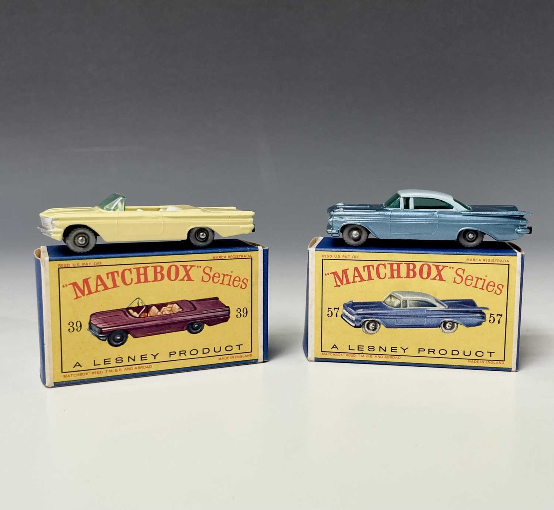 Lesney - Matchbox Toys nos 39 and 57. Pontiac Convertible, lemon body, crimson base, cream