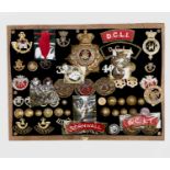 Cornwall Regiments: Duke of Cornwall Light Infantry, etc. Comprising a board mounted framed and