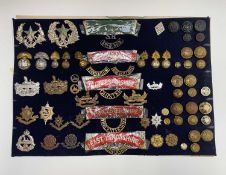 English and Scottish Regiments - 26th-30th Foot. A display card containing cap badges, collar