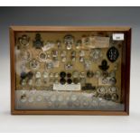 Volunteer Battallions. Comprising a board mounted framed and glazed display of badges, collar