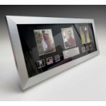 Golfing Interest - Tiger Woods. Lot comprises a framed and glazed set of photographs and six film