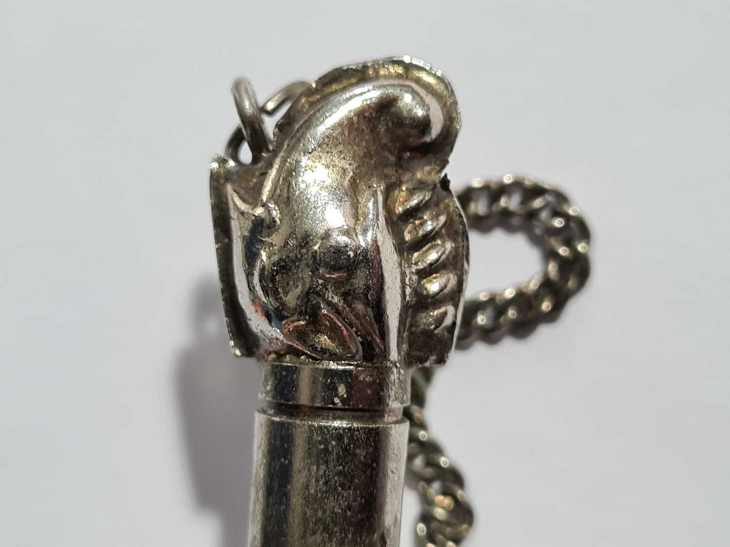 A white metal mounted shell scent bottle 8.4 cm long, together with a white metal and hardstone - Image 12 of 14