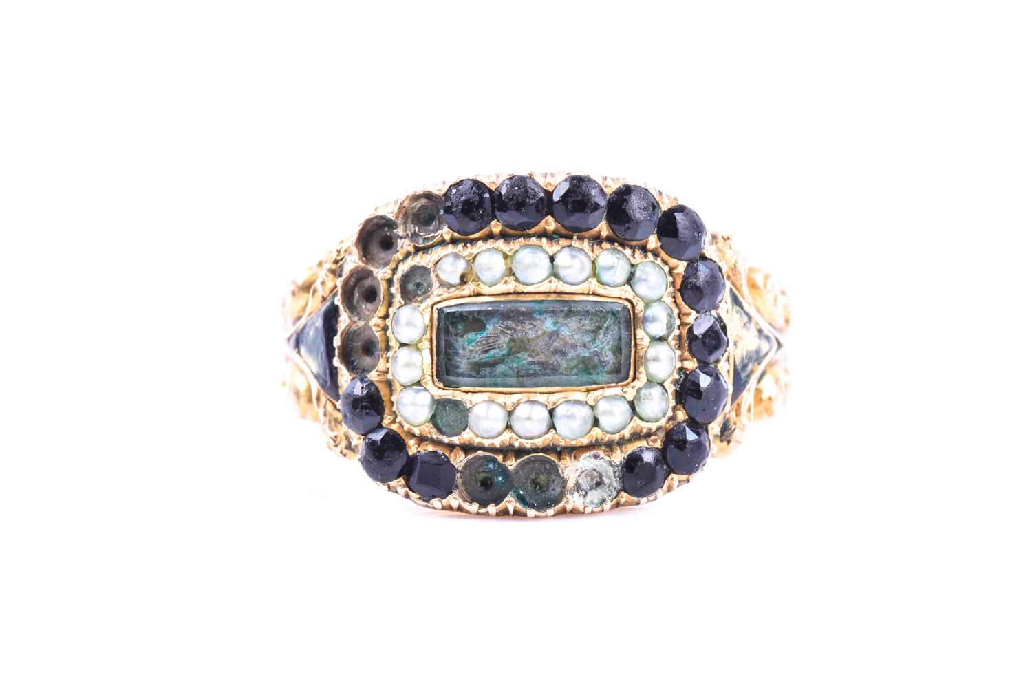 A Georgian yellow gold mourning ring, with pearl and black stone decoration (a/f) with glass