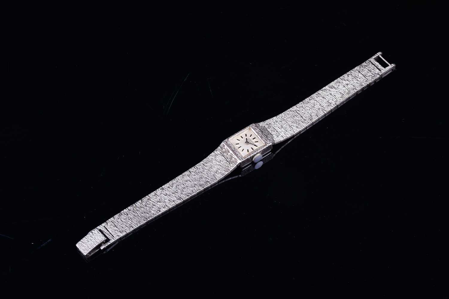 A Limit of Switzerland ladies silver wristwatch, the square dial with baton markers, on a textured - Image 7 of 7