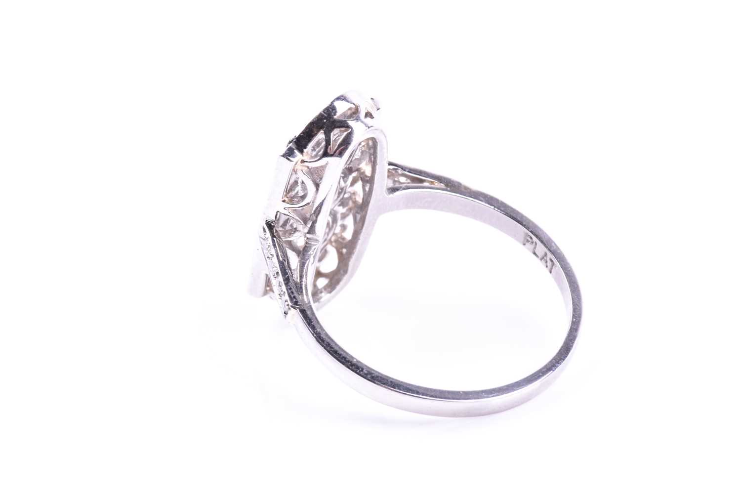 A platinum and diamond ring, in the Art Deco style, the lozenge-shaped plaque ring inset with - Image 3 of 5