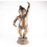 A large Indian bronze figure of Krishna, 19th/20th century, modelled in dancing pose, wearing