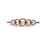 An early 20th century yellow metal, turquoise, and pearl bar brooch, the stones set in circular