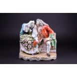 A large Samson of Paris porcelain figure group, bearing a Derby mark, a gentleman and lady seated on