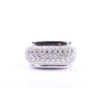 An unusual diamond cocktail ring, pave-set with round brilliant-cut diamonds on an angular mount,