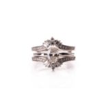 A 14ct white gold and mixed oval-cut solitaire diamond ring, the oval-cut diamond of approximately