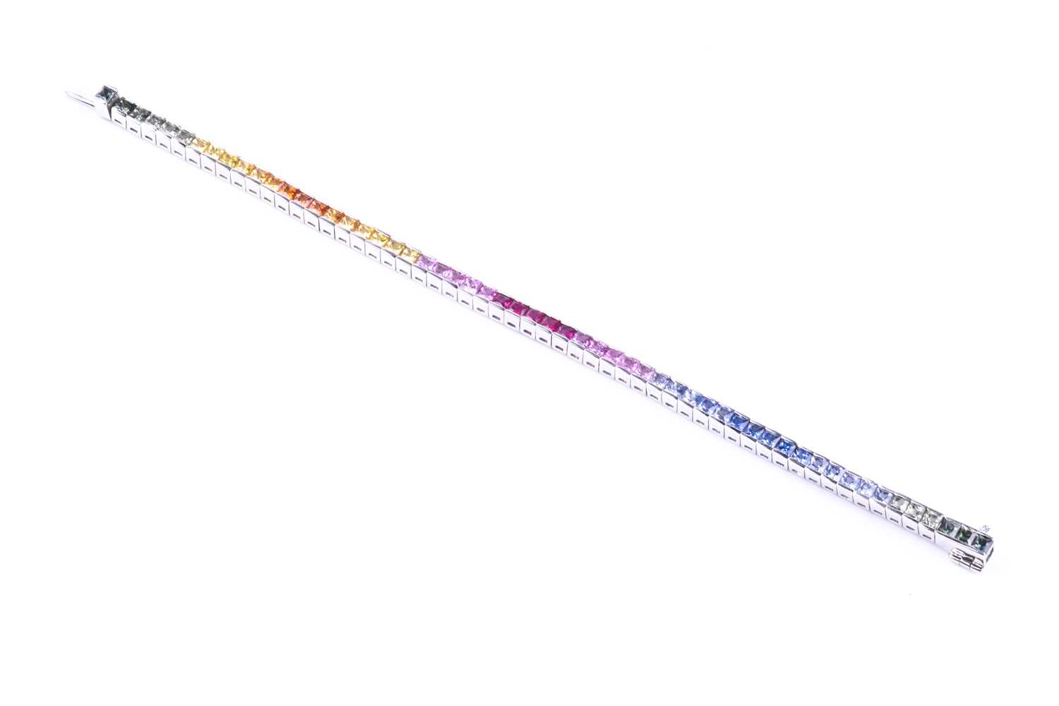 An 18ct white gold and rainbow sapphire bracelet, set with multi-coloured sapphires ranging from - Image 7 of 9