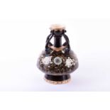 A Japanese Satsuma vase, late Meiji/Taisho period, the mouth upon a short neck surrounded by four