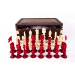 A rare Chinese Canton carved natural and stained ivory figural chess set, 19th century, 中国，